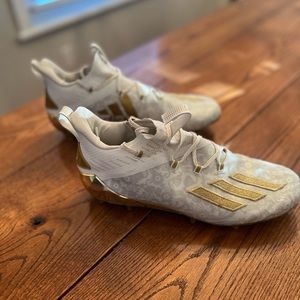 Mens gold and white Adidas cleats size 11